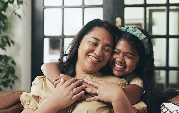 mother and daughter getting along and smiling
